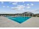Community pool with a pool house and lounge chairs at Tbd3 Kapalua Loop, Little River, SC 29566