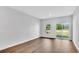 Bright bedroom with hardwood floors and sliding glass door at 301 Sandridgebury Dr. # 68, Little River, SC 29566