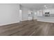 Spacious living room with hardwood floors and access to kitchen at 301 Sandridgebury Dr. # 68, Little River, SC 29566
