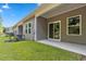 Private patio with sliding glass doors and access to the backyard at 301 Sandridgebury Dr. # 68, Little River, SC 29566