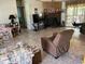 Living room with fireplace and access to deck at 12727 Ocean Highway, Pawleys Island, SC 29585