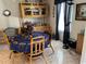 Dining area with round table and bamboo chairs at 12727 Ocean Highway, Pawleys Island, SC 29585