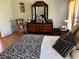 Main bedroom with dresser, and zebra patterned bedding at 12727 Ocean Highway, Pawleys Island, SC 29585