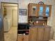 Kitchen with microwave, extra counter space, and laundry access at 12727 Ocean Highway, Pawleys Island, SC 29585