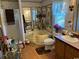 Bathroom with corner bathtub, double sinks, and shower at 12727 Ocean Highway, Pawleys Island, SC 29585