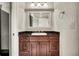 Small bathroom with dark wood vanity and granite countertop at 400 Foxtail Dr., Longs, SC 29568