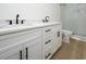 Bathroom boasts double vanity and walk-in shower at 118 B 16Th Ave. S, Surfside Beach, SC 29575