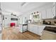 Galley kitchen with white cabinets and a breakfast bar at 129 Meadowview Rd., Marion, SC 29571