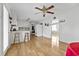 Eat-in kitchen with white cabinets, breakfast bar, and view of backyard at 129 Meadowview Rd., Marion, SC 29571