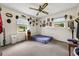 Well-lit bedroom featuring a twin bed, and various wall decor at 129 Meadowview Rd., Marion, SC 29571