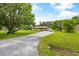 Brick ranch house with a large yard and driveway at 129 Meadowview Rd., Marion, SC 29571