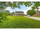Brick ranch house with a large yard and driveway at 129 Meadowview Rd., Marion, SC 29571