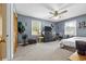 Spacious bedroom with carpet flooring, large windows and built-in dresser at 129 Meadowview Rd., Marion, SC 29571