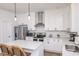 Modern kitchen with white cabinets and stainless steel appliances at 104 Tidal Creek Dr., Murrells Inlet, SC 29576