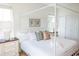 Main bedroom with a white canopy bed and two nightstands at 116 Tidal Creek Dr., Murrells Inlet, SC 29576