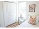 Bedroom with white twin bed, closet, and botanical print at 116 Tidal Creek Dr., Murrells Inlet, SC 29576