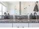 Double vanity with granite countertop and black faucets at 116 Tidal Creek Dr., Murrells Inlet, SC 29576
