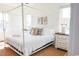 Main bedroom with a white canopy bed and two nightstands at 116 Tidal Creek Dr., Murrells Inlet, SC 29576