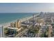 Aerial view of Myrtle Beach Boardwalk, Ferris wheel, and ocean at 2207 S Ocean Blvd. # 1101, Myrtle Beach, SC 29577