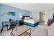 Bedroom with queen bed, and small sitting area at 2207 S Ocean Blvd. # 1101, Myrtle Beach, SC 29577