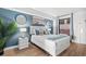 Bedroom with a queen bed and calming blue decor at 2207 S Ocean Blvd. # 1521, Myrtle Beach, SC 29577