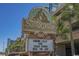 Sandcastle South sign with tiki bar and vacancy info at 2207 S Ocean Blvd. # 1521, Myrtle Beach, SC 29577