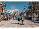 People stroll along the boardwalk near shops and restaurants at 2207 S Ocean Blvd. # 921, Myrtle Beach, SC 29577