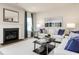 Spacious living room featuring a cozy fireplace and plush seating at 792 Indigo Bay Circle, Myrtle Beach, SC 29579