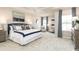Large main bedroom with plush carpeting and sitting area at 792 Indigo Bay Circle, Myrtle Beach, SC 29579