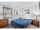 Cozy bedroom with a double bed and wooden nightstands at 920 N Waccamaw Dr. # 2106, Garden City Beach, SC 29576