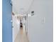 Bright hallway with tile flooring at 920 N Waccamaw Dr. # 2106, Garden City Beach, SC 29576