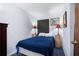 Cozy bedroom with a double bed, nightstands, and artwork at 920 N Waccamaw Dr. # 2106, Garden City Beach, SC 29576