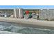 Aerial view of beachfront property, showing building and surrounding area at 920 N Waccamaw Dr. # 2106, Garden City Beach, SC 29576