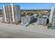 Aerial view of beachfront property with pool, close to ocean at 920 N Waccamaw Dr. # 2106, Garden City Beach, SC 29576