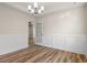 Bright dining room with hardwood floors and French doors at 623 Carter Reid Ct., Longs, SC 29568