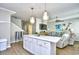 Open concept kitchen with island and stainless steel appliances at 6001 South Kings Hwy., Myrtle Beach, SC 29575