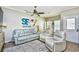 Relaxing living room featuring comfortable seating and coastal decor at 6001 South Kings Hwy., Myrtle Beach, SC 29575