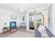 Living room with ocean view, balcony access, comfy seating, and dining area at 9400 Shore Dr. # 308, Myrtle Beach, SC 29572