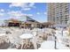 Large outdoor patio area with white plastic tables and chairs at 9550 Shore Dr. # 224, Myrtle Beach, SC 29572