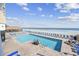Oceanfront pool and deck area with lounge chairs and a beachfront view at 9550 Shore Dr. # 224, Myrtle Beach, SC 29572