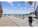 Brick paved pool deck with lounge chairs and ocean views at 9550 Shore Dr. # 224, Myrtle Beach, SC 29572