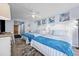 Bright guest bedroom with two double beds and coastal decor at 9550 Shore Dr. # 224, Myrtle Beach, SC 29572