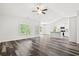 Open-concept living room with kitchen and island at 137 Six Mile Creek Dr., Georgetown, SC 29440