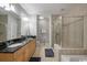 Elegant bathroom with double sinks, granite countertop, and large shower at 9994 Beach Club Dr. # 703, Myrtle Beach, SC 29572