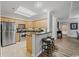 Modern kitchen with stainless steel appliances and breakfast bar at 9994 Beach Club Dr. # 703, Myrtle Beach, SC 29572