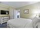 Bedroom with a full-size bed and view of the kitchen at 2311 S Ocean Blvd. # 341, Myrtle Beach, SC 29577