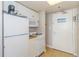 Small kitchen with a microwave, stove and refrigerator at 2207 S Ocean Blvd. # 414, Myrtle Beach, SC 29577