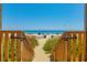 Beach access via wooden walkway at 2207 S Ocean Blvd. # 414, Myrtle Beach, SC 29577