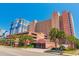 Oceanfront building with parking and palm trees at 2207 S Ocean Blvd. # 915, Myrtle Beach, SC 29577
