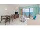 Living room with sofa, table, and ocean view at 2207 S Ocean Blvd. # 915, Myrtle Beach, SC 29577
